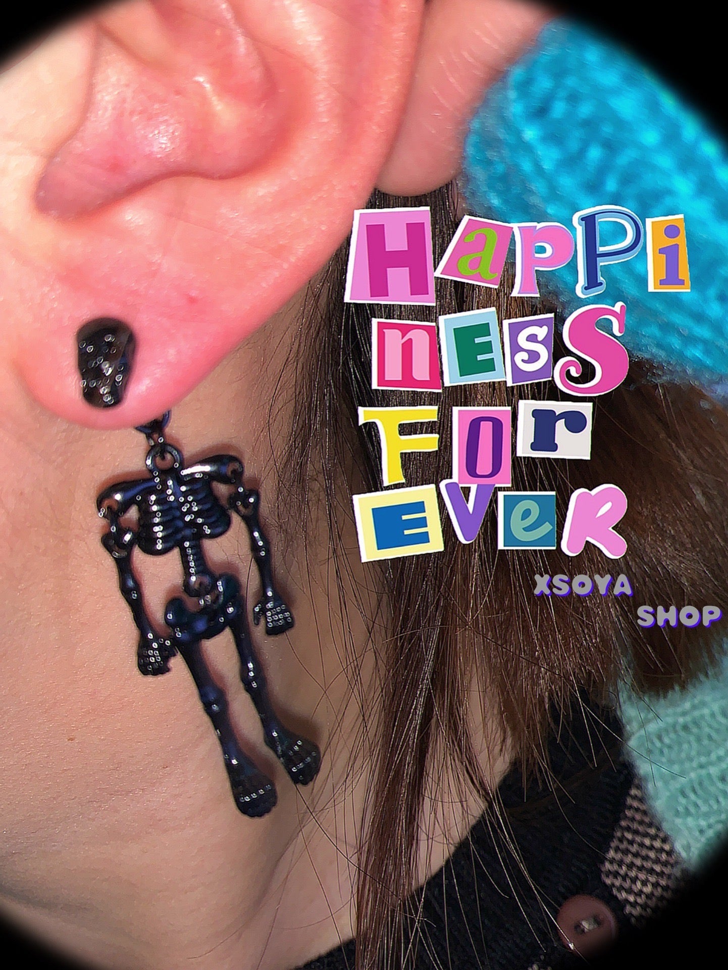 A pair of playful small stud earrings with movable hands and feet of punk INS skull